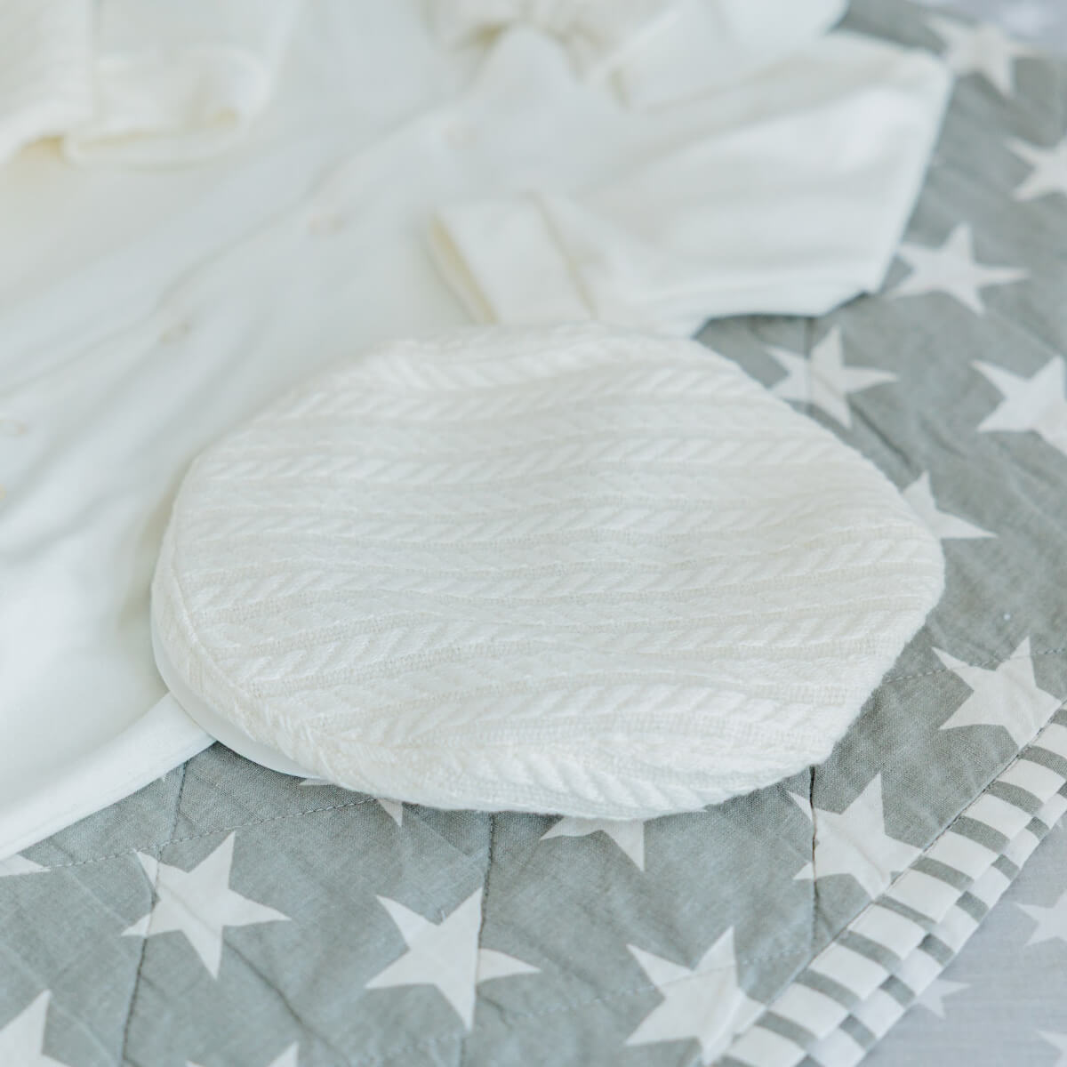 Boy Christening Hat on a gray blanket with white star pattern