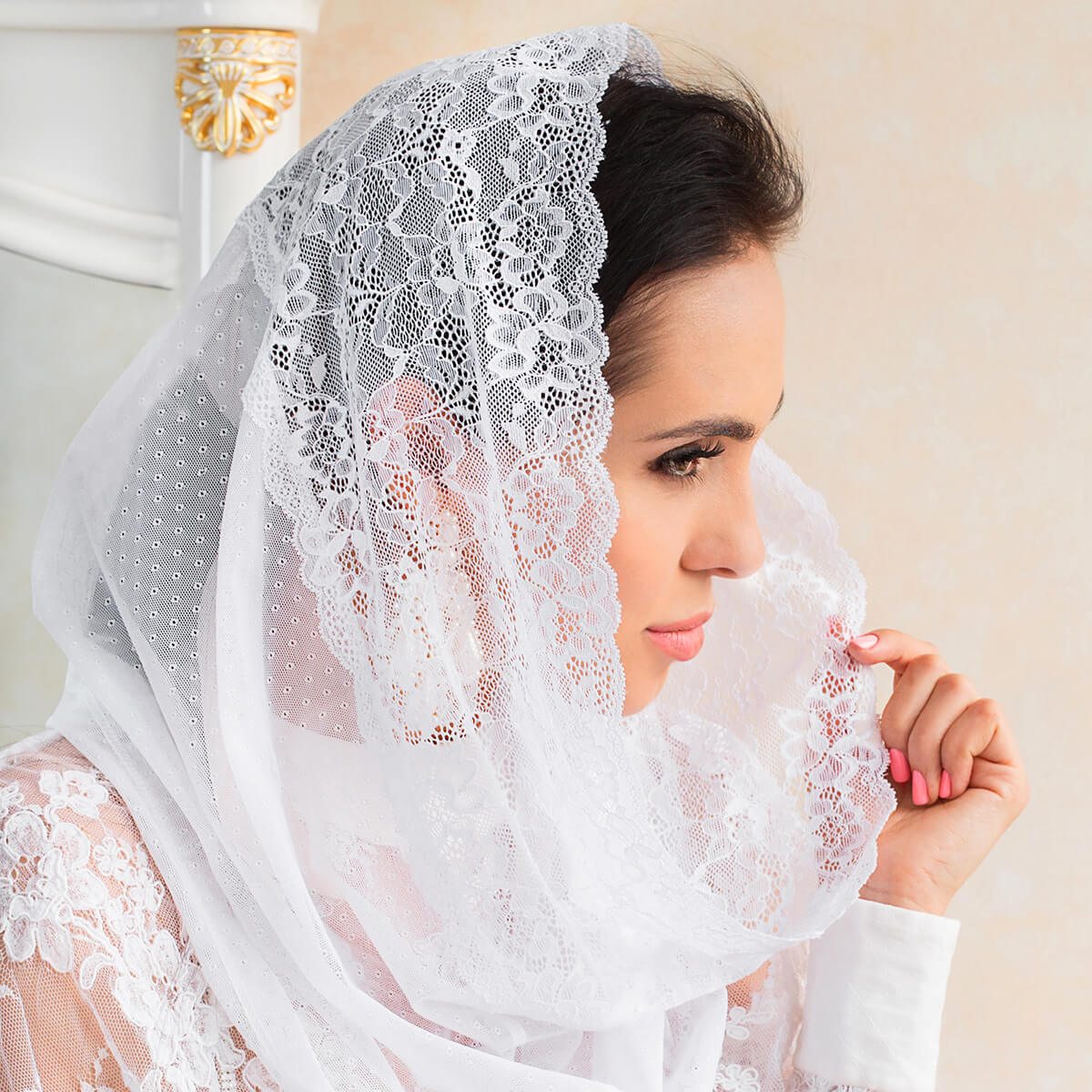 Woman wearing a Infinity Veil against a neutral background