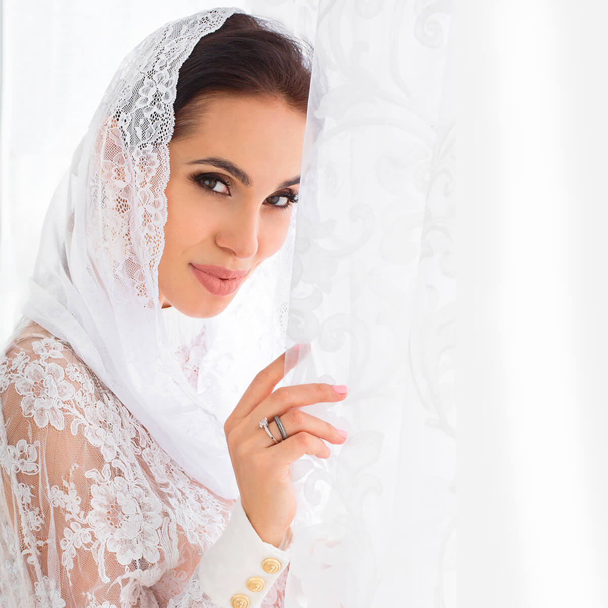 Woman wearing a Infinity Veil on a white background