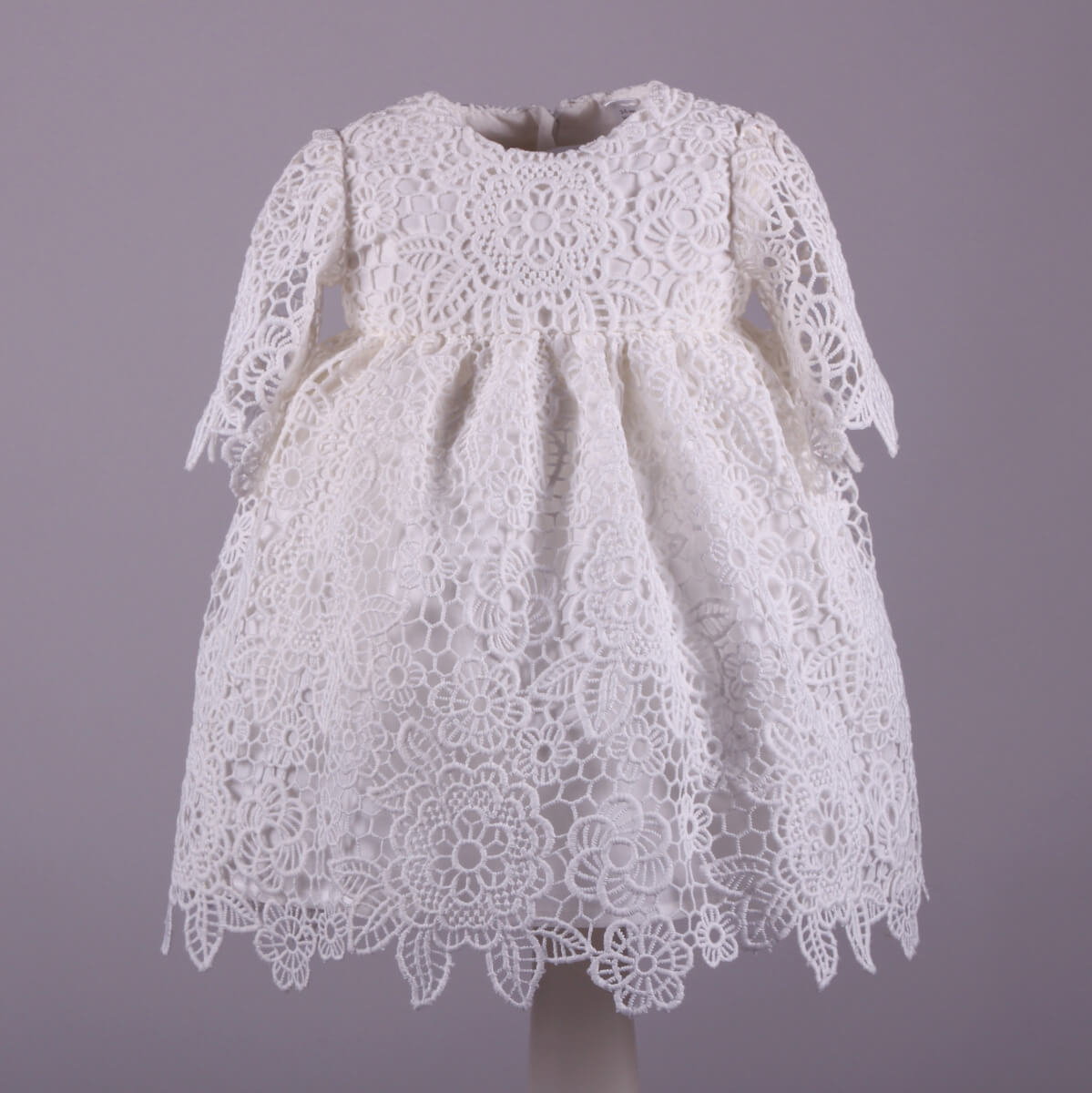 Lace Baptism Dress on a mannequin against a gray background