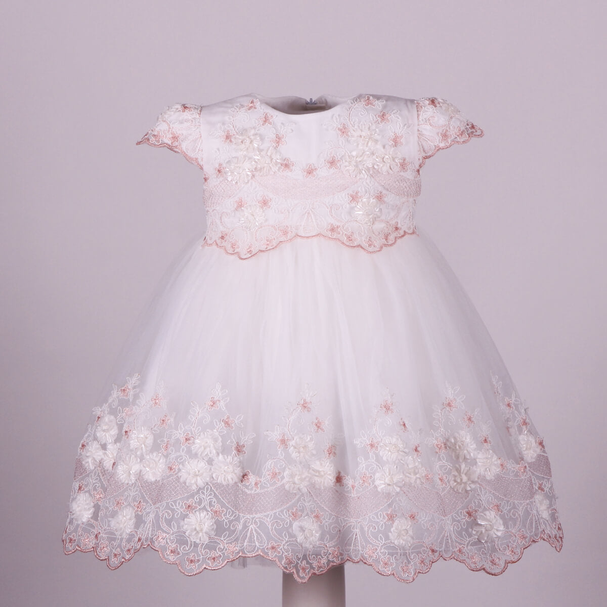 Baptism Dress with Floral Lace on a light gray background