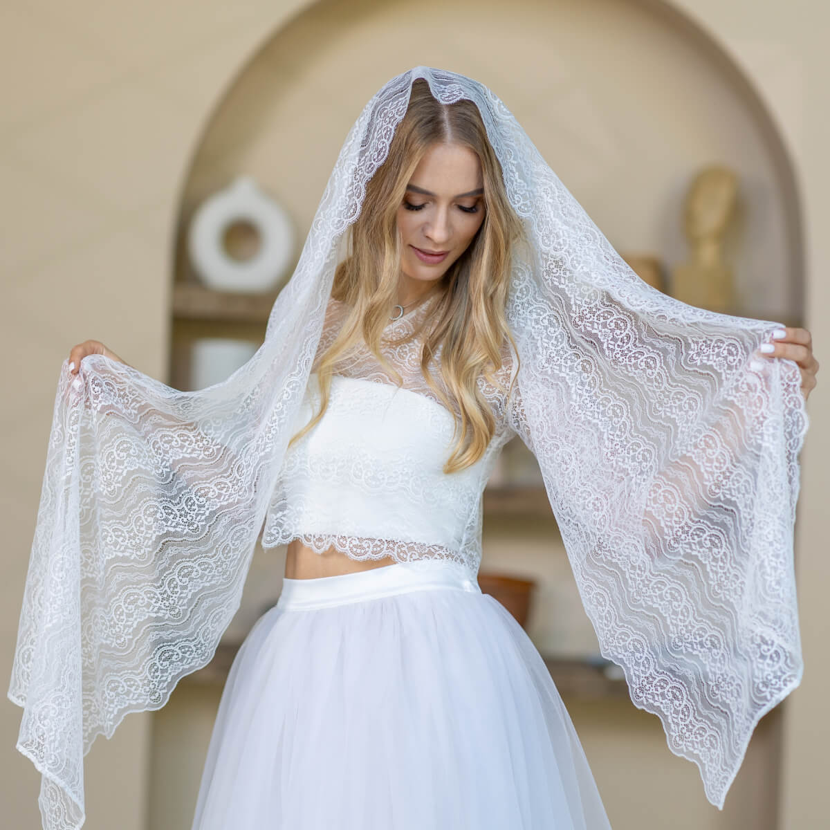 Woman wearing a Lace Chapel Veil