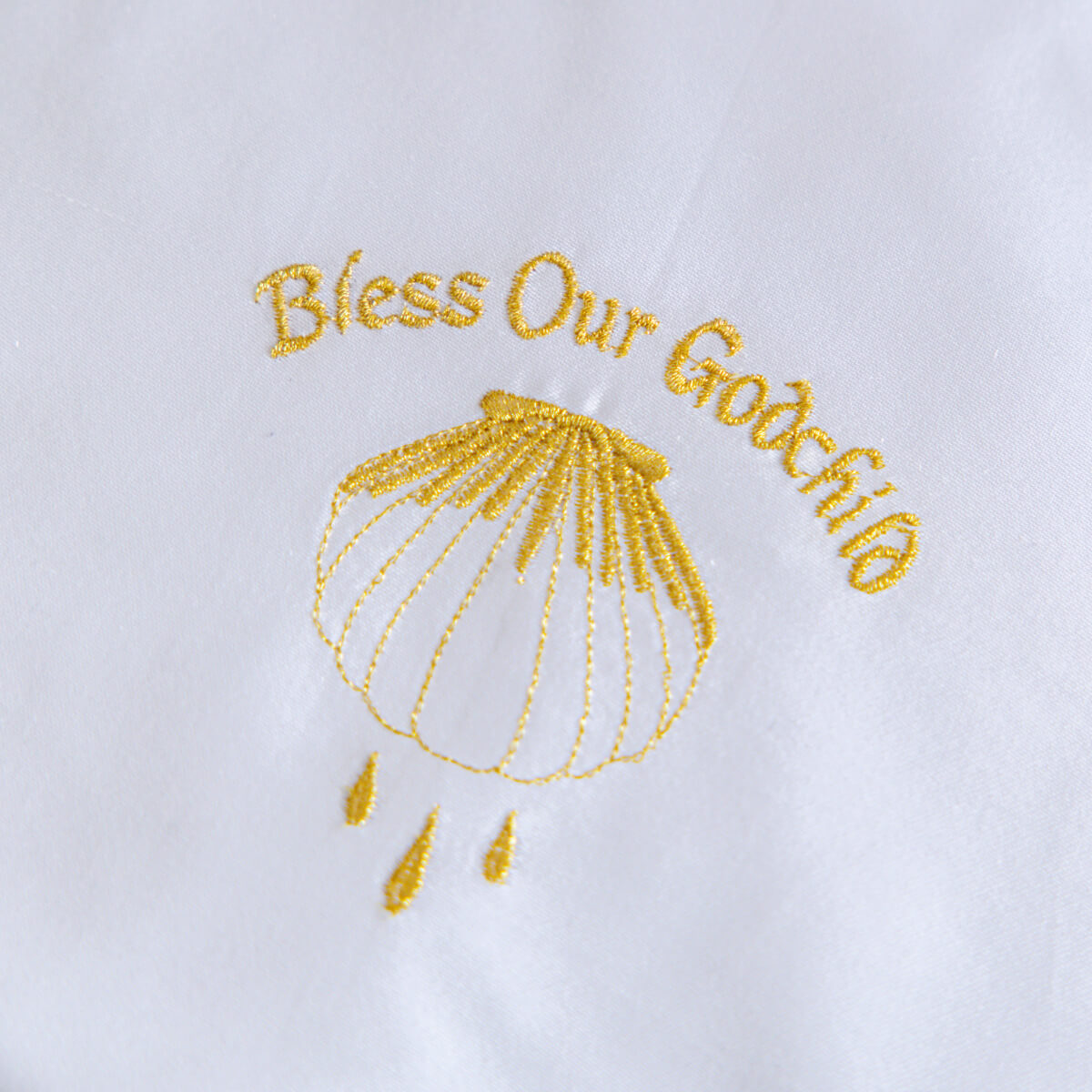 Embroidered design with 'Bless Our Godchild' text on Candle Wraps for Godparents on a white background