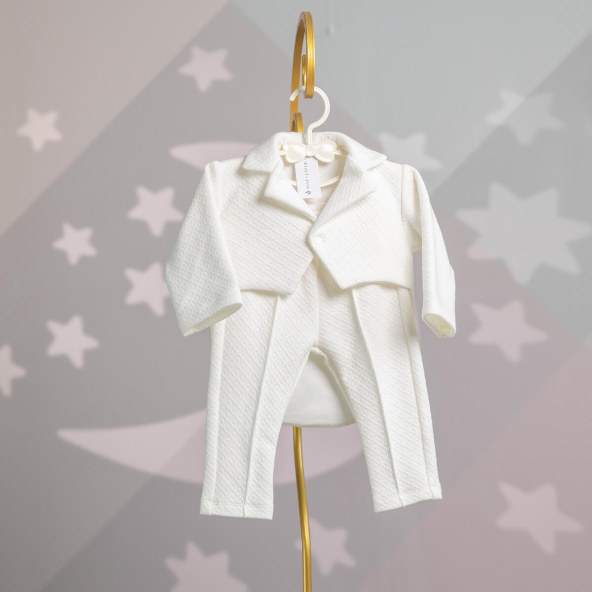 Baby Boy Baptism Suit – on a hanger against a star-patterned background