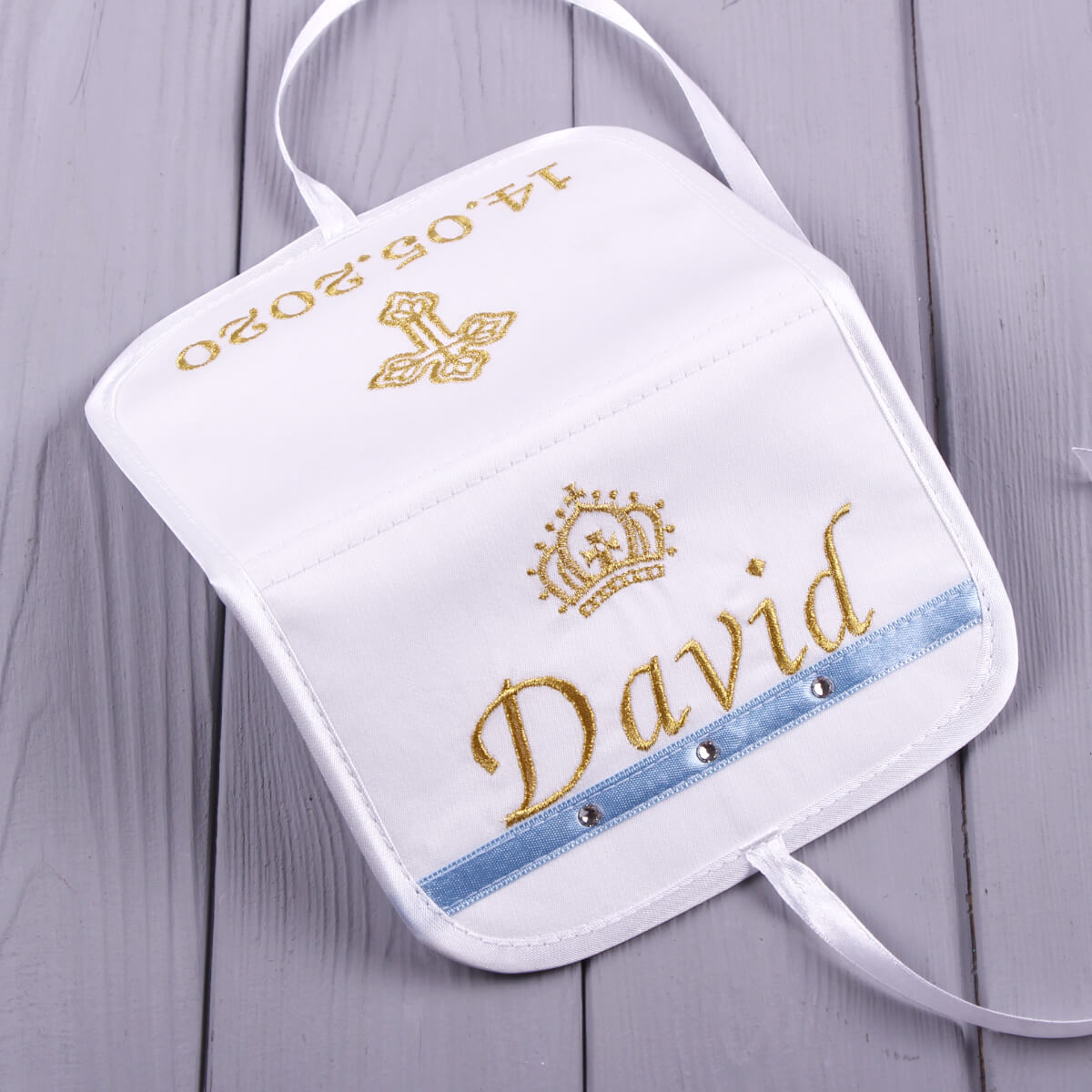 First Curl Keepsake Box with 'David' and a cross on a wooden surface