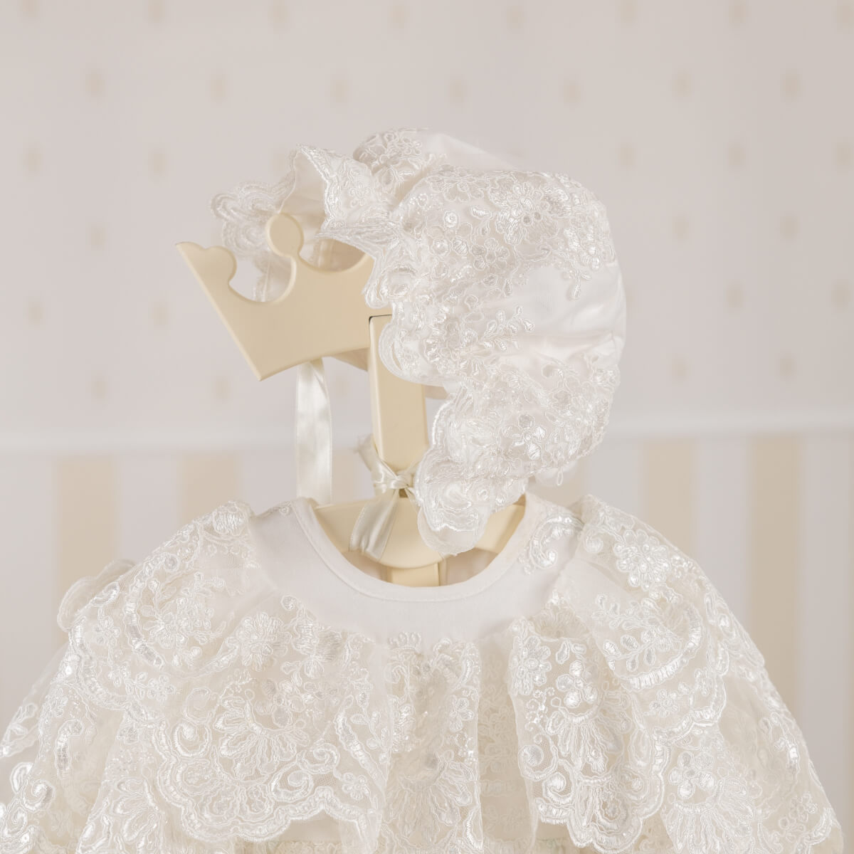 Ivory lace christening. set on a hanger