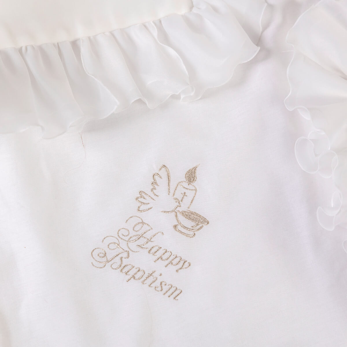White fabric with embroidered 'Happy Baptism' text and design.