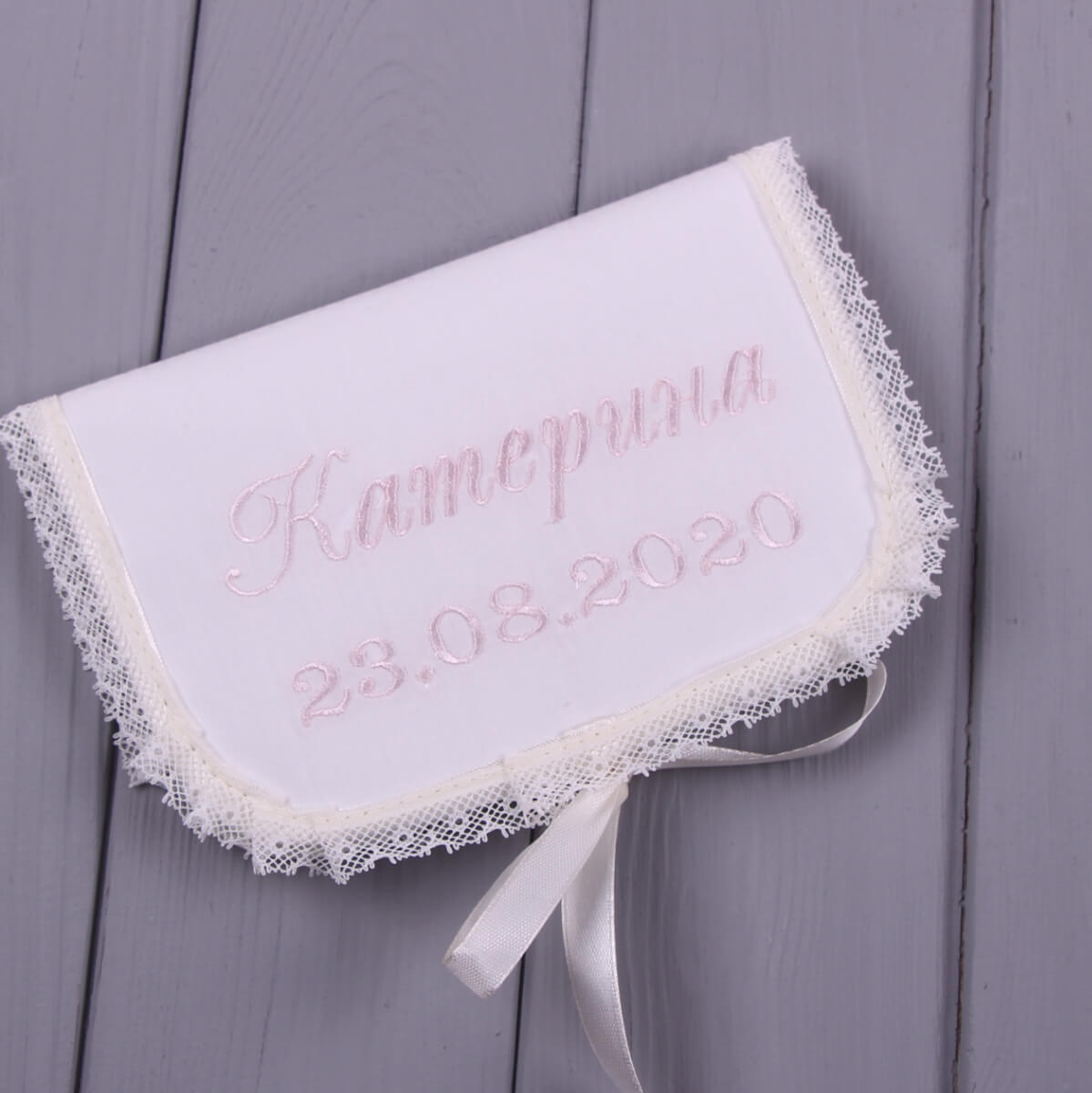 Baby Baptism Keepsake Box with lace trim and embroidered text on a wooden surface