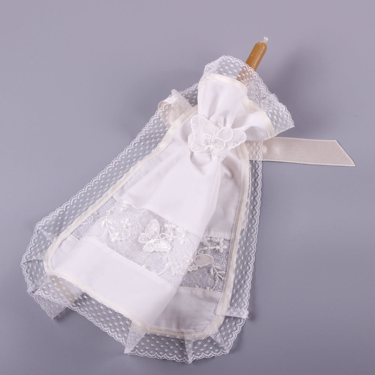 Candle Wraps with a wooden handle on a gray background