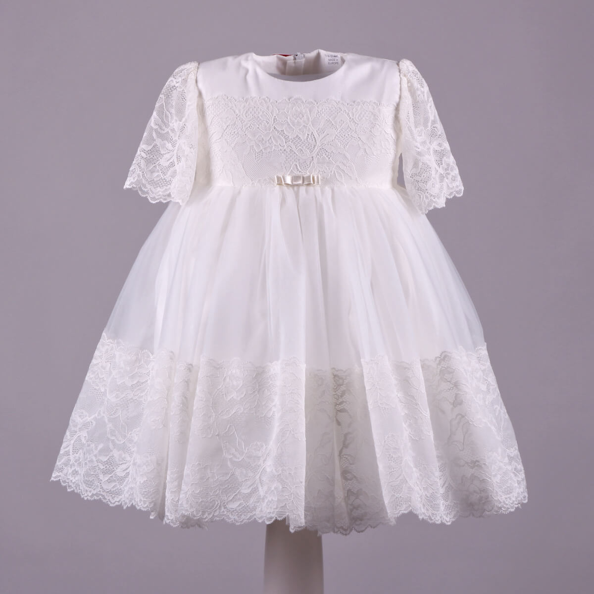Baptism Tulle Lace Dress on a gray background