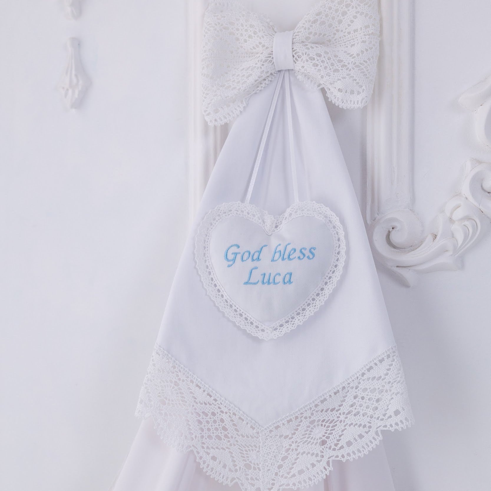 Personalized Baby Keepsake with a heart-shaped name tag on a white background