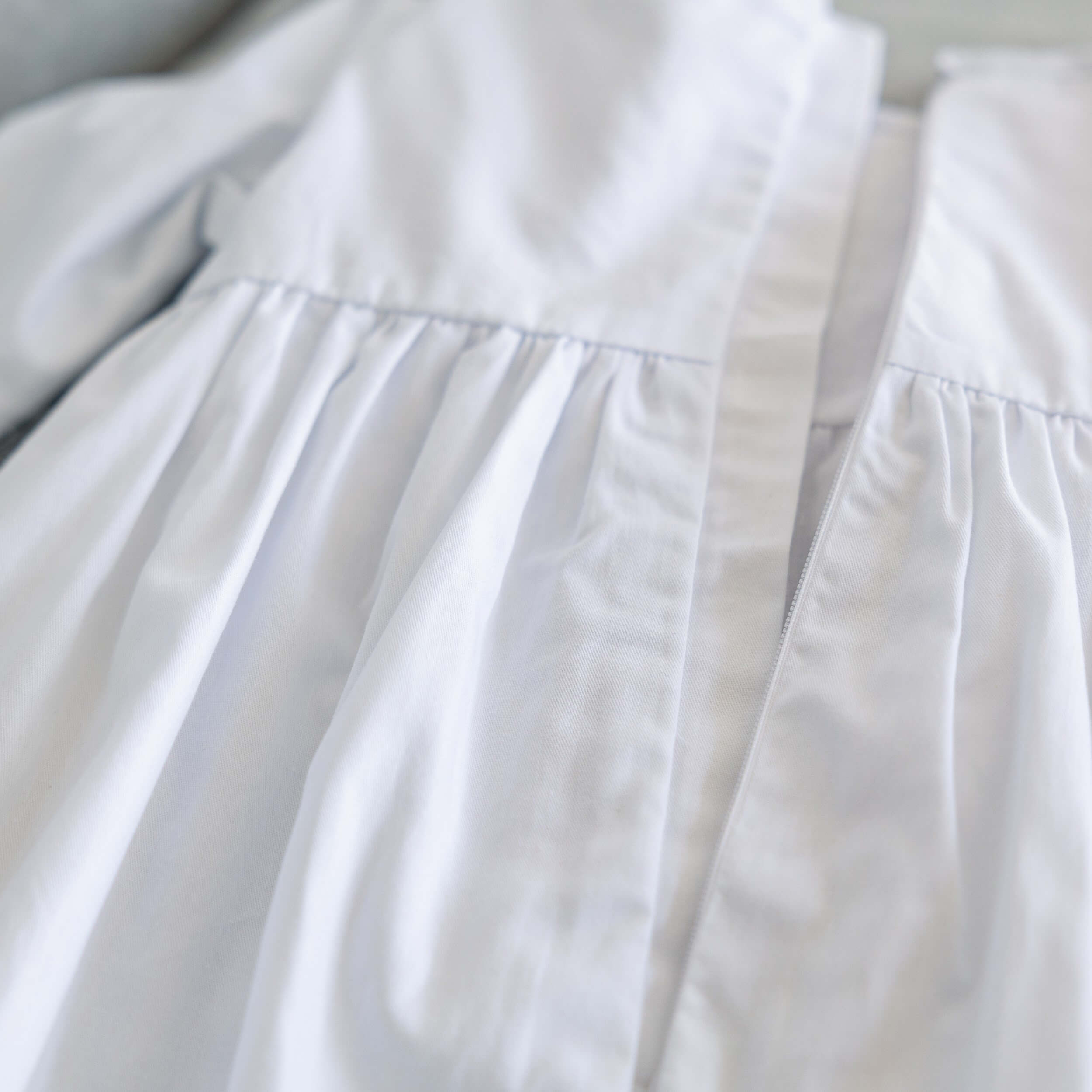 Close-up of a  Christening Gown for Girls  with a soft texture