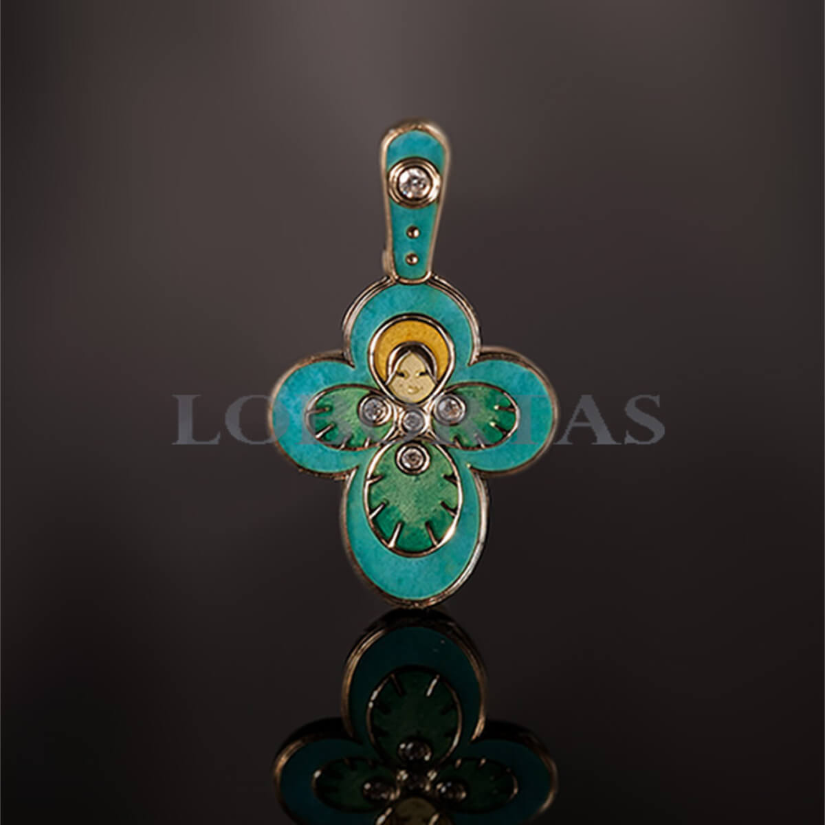 Baby baptism. cross pendant with turquoise enamel and gold accents on a dark background