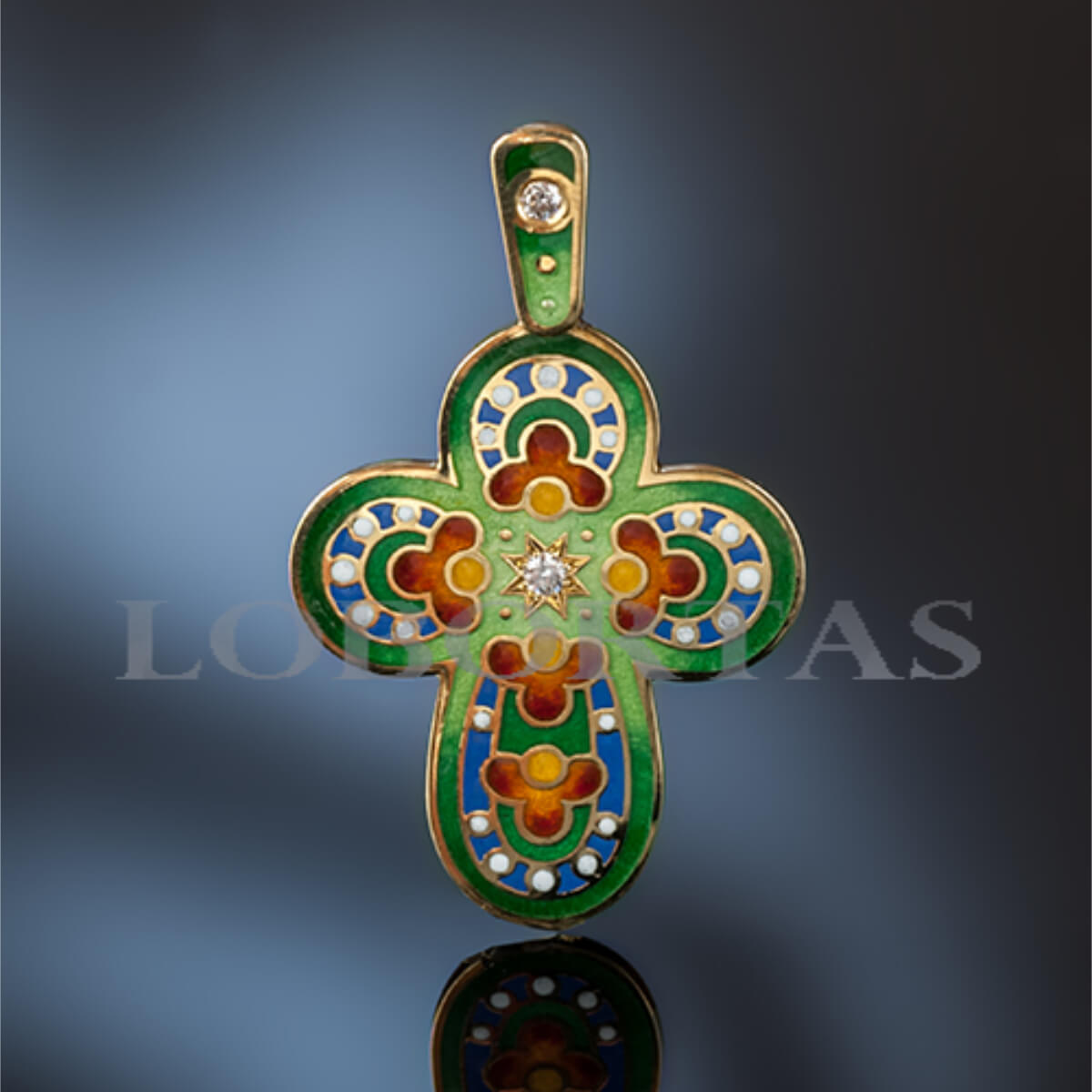 Decorative cross pendant with colorful enamel and gemstones on a gradient background