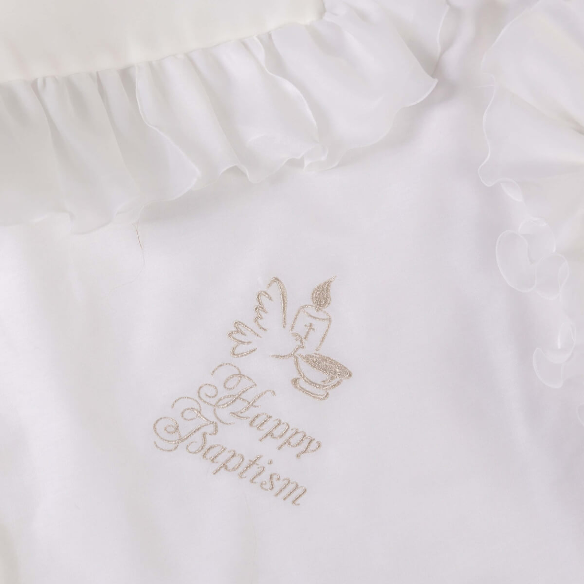 White fabric with 'Happy Baptism' embroidery on a white background