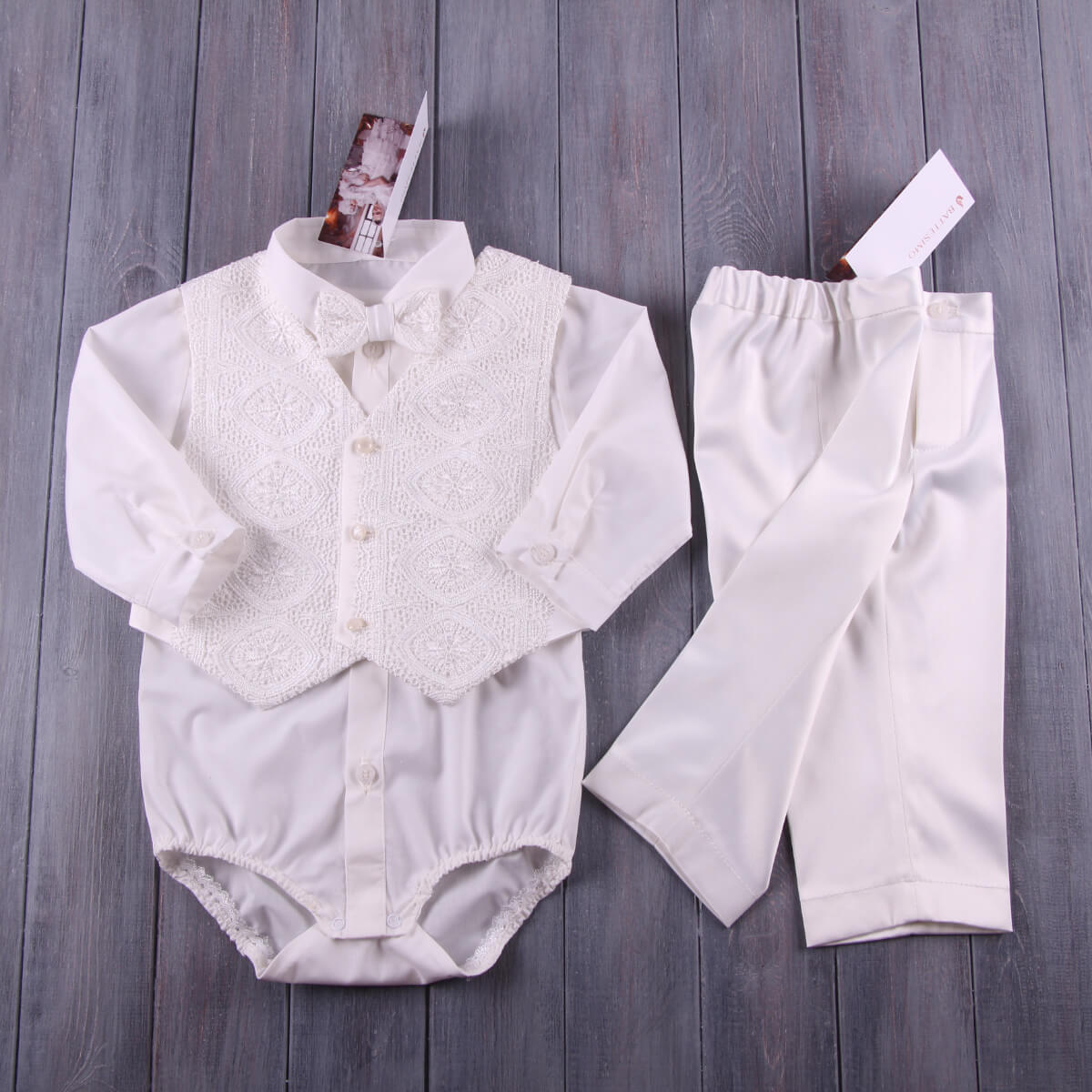  Baby Boy Baptism Suit with shirt, vest, and pants on a wooden surface