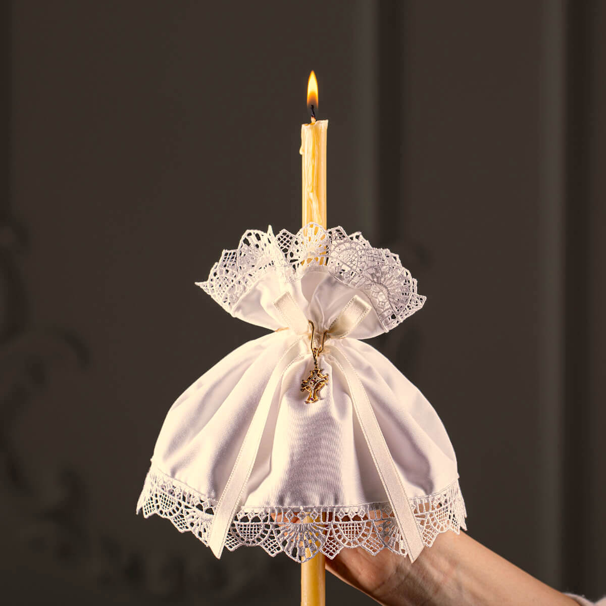 Candle Wraps for Godparents  with lace cover and star charm on a dark background