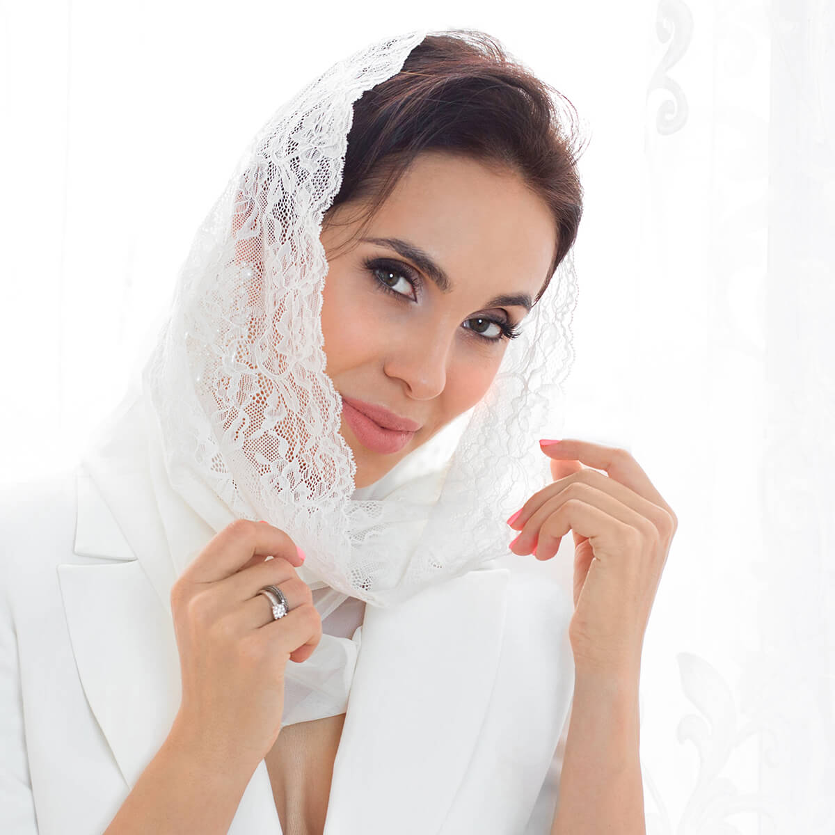 Woman wearing a  Infinity Veil
