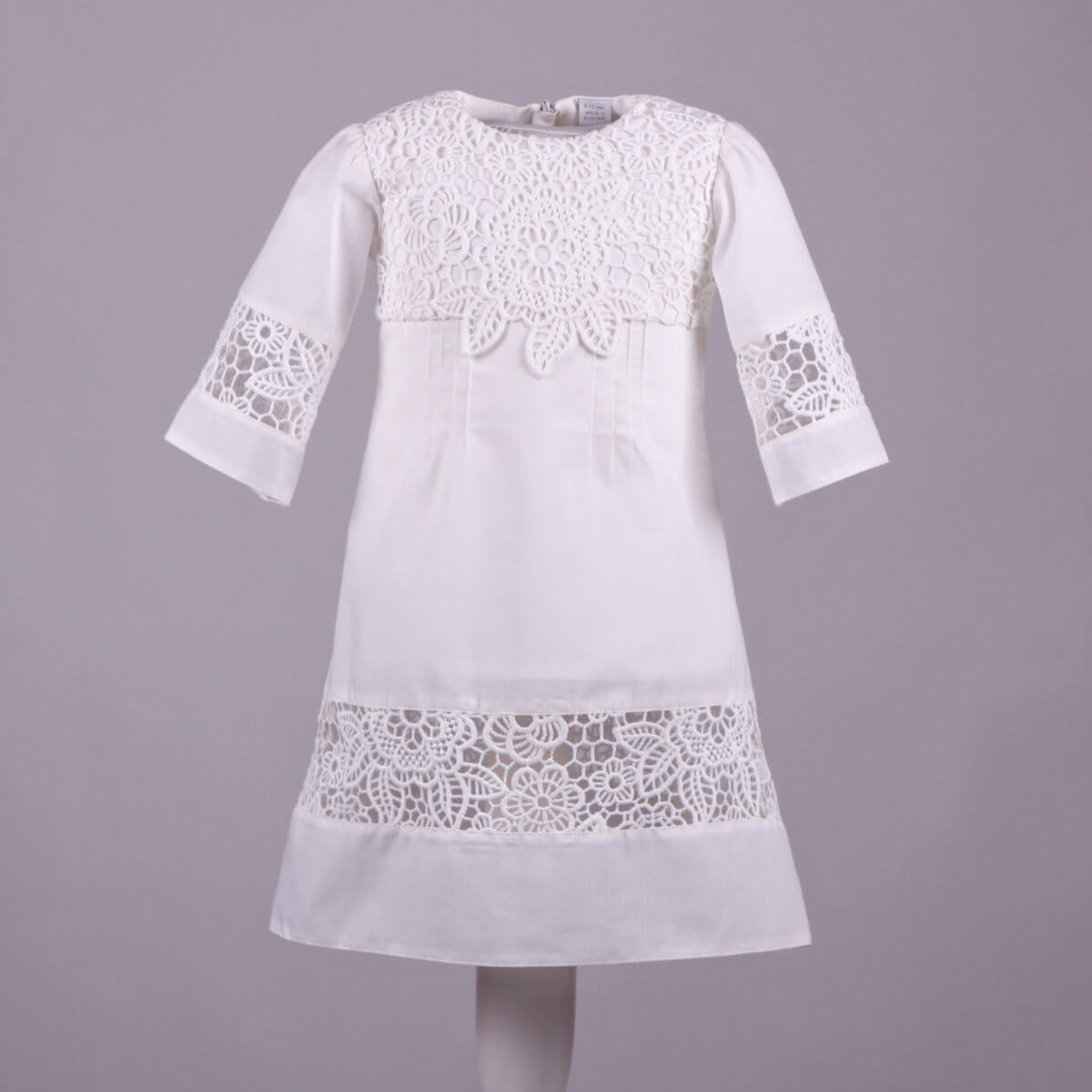  Baptism Gown for Baby Girl with lace details on a gray background
