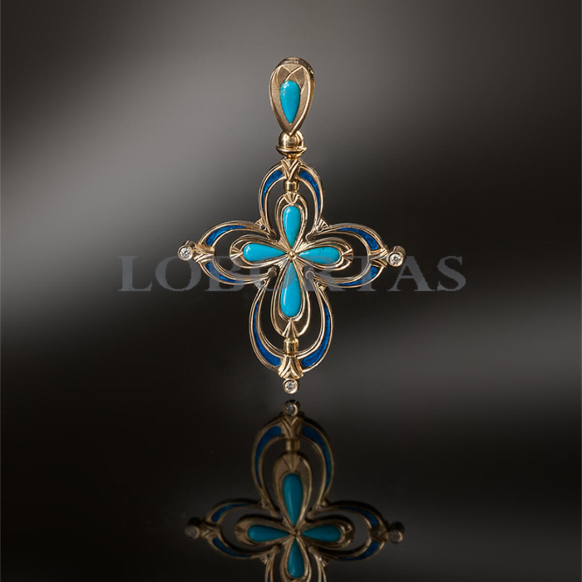 Handmade gold cross pendant with turquoise stones on a dark background