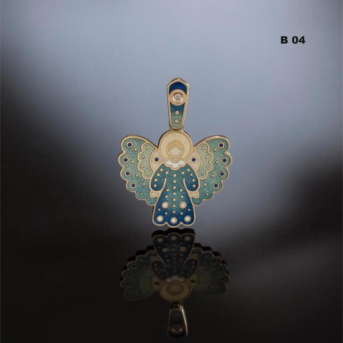 BAptism gift angel pendant on a reflective surface with a gradient background
