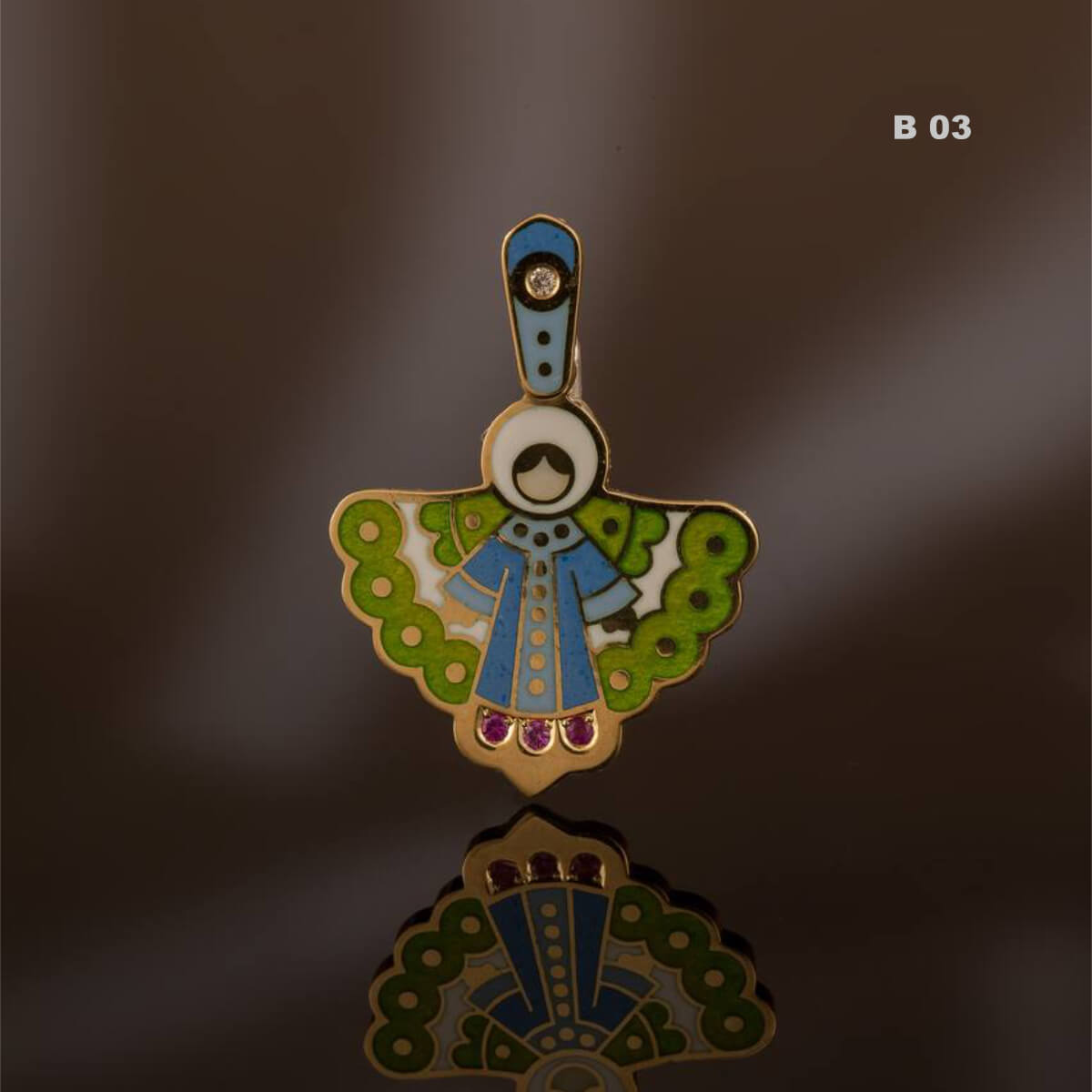 Baptism angel pendant with intricate design on a reflective surface