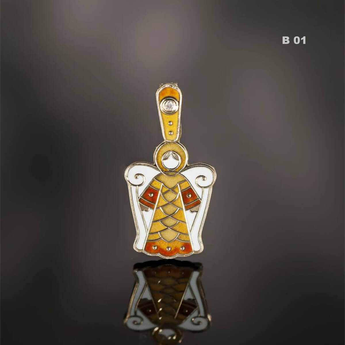 Decorative pendant with intricate design on a reflective surface