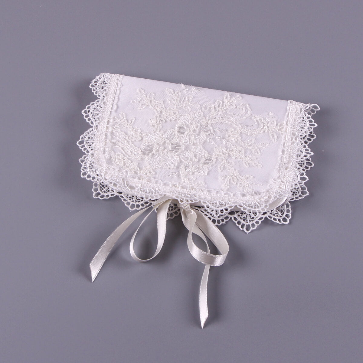 Baby First Curl Keepsake Box with ribbons on a gray background