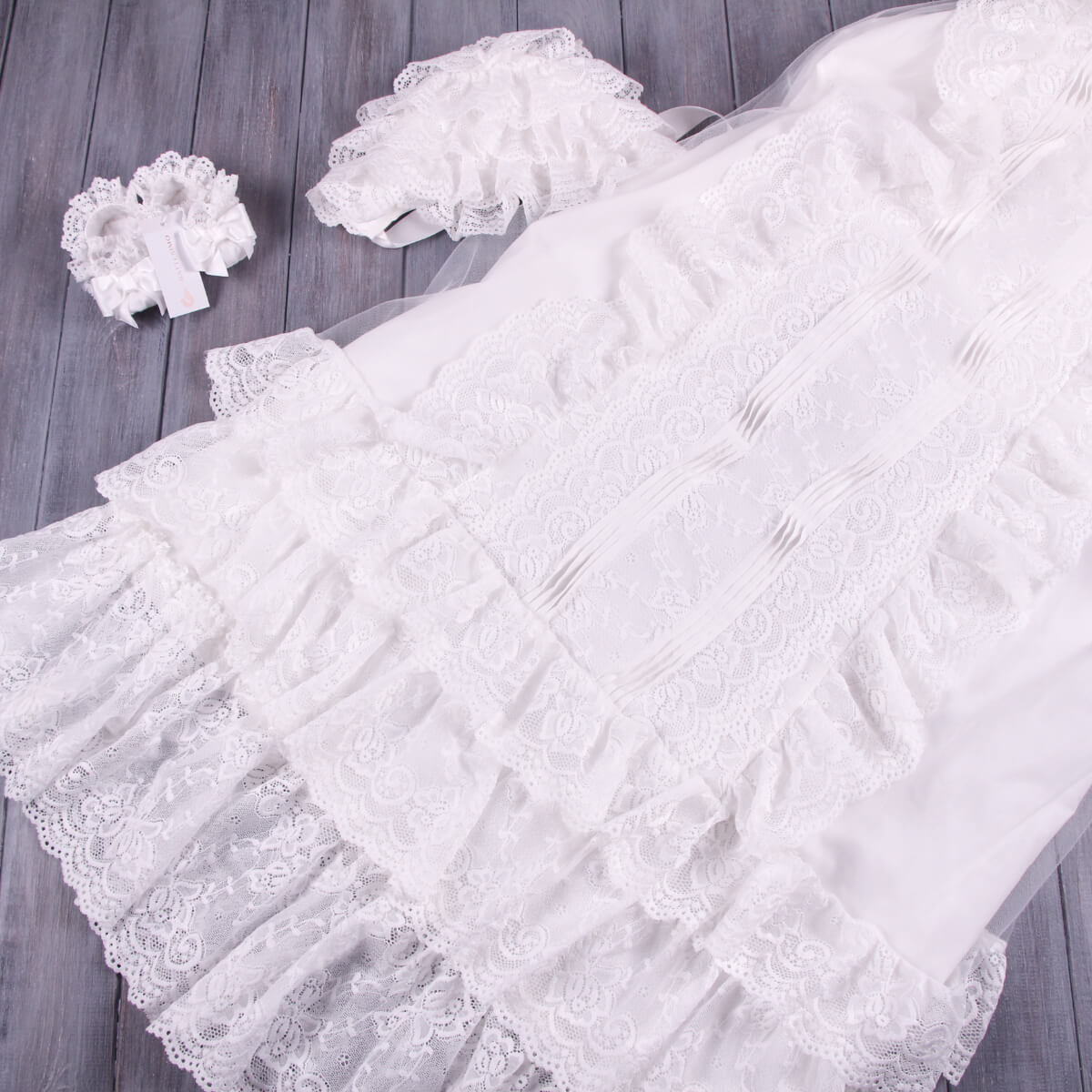 White lace fabric with a wooden background