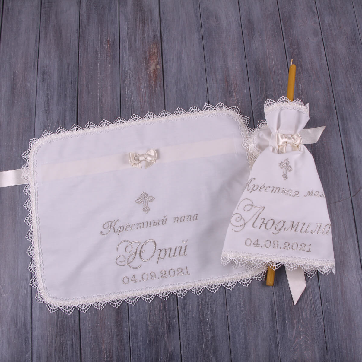 Christening Candle Wraps with a candle on a wooden background