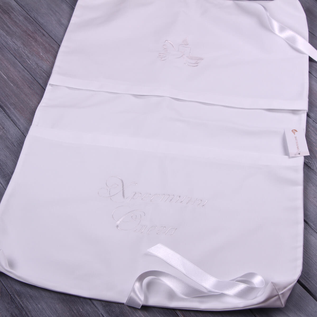 Baby Keepsake with a ribbon on a wooden surface