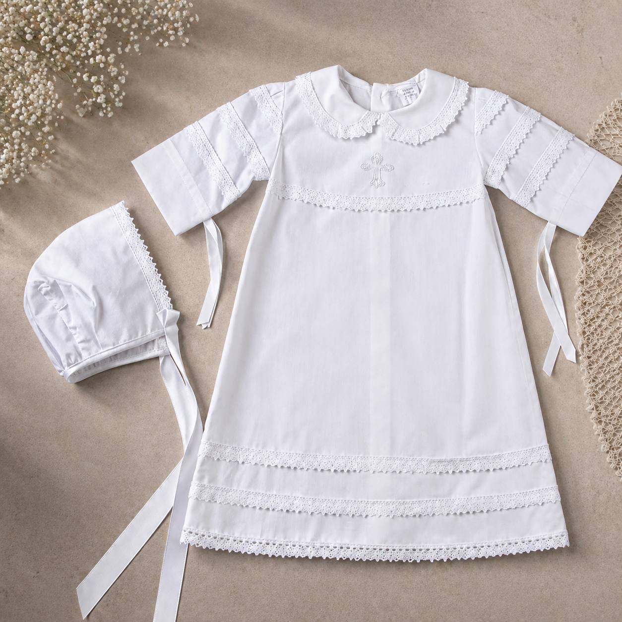 Personalized CHRISTENING Gown with Hat on a beige background