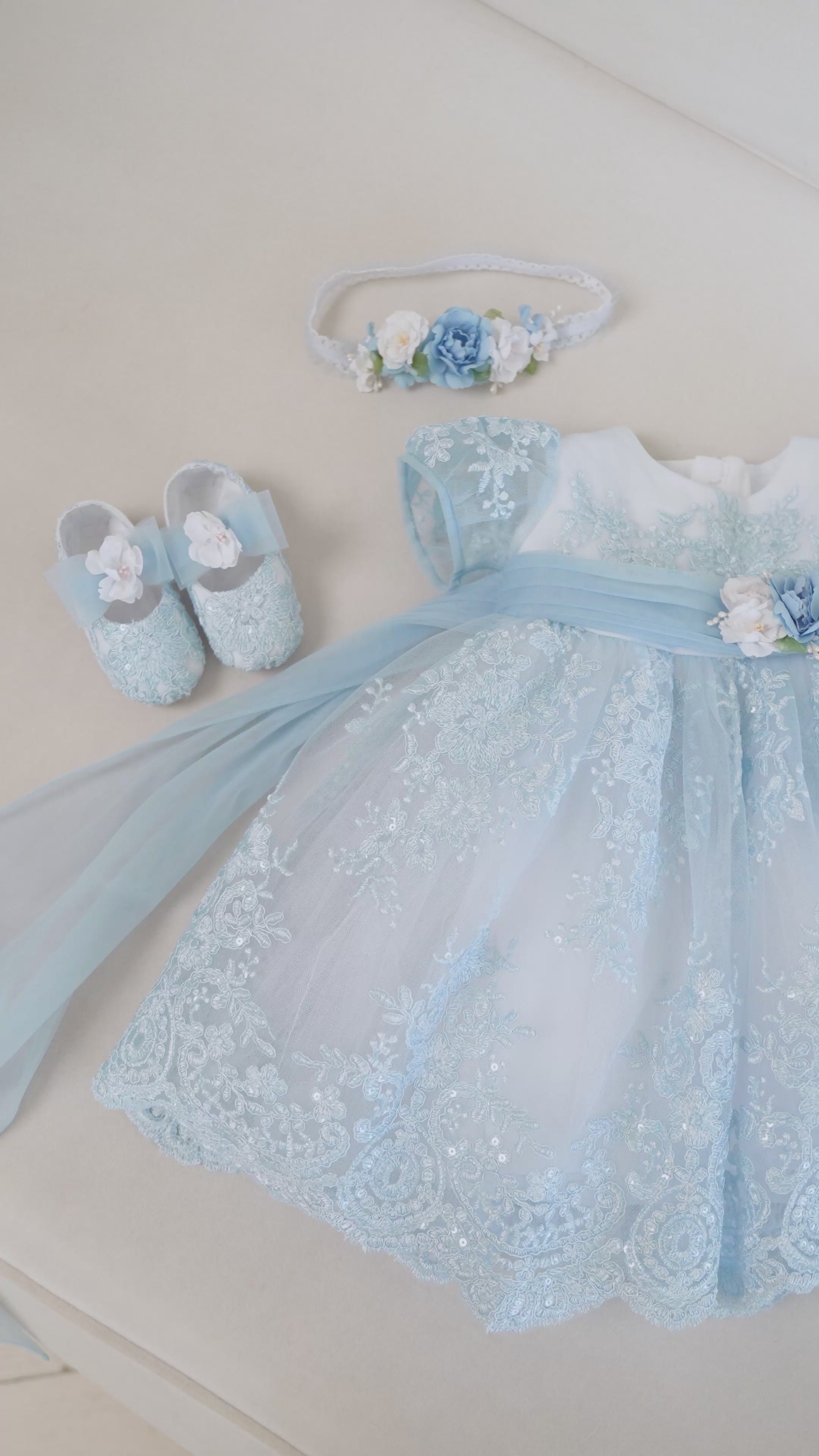 Blue lace flower girl dress handmade in Europe with cotton lining and layered tulle. 