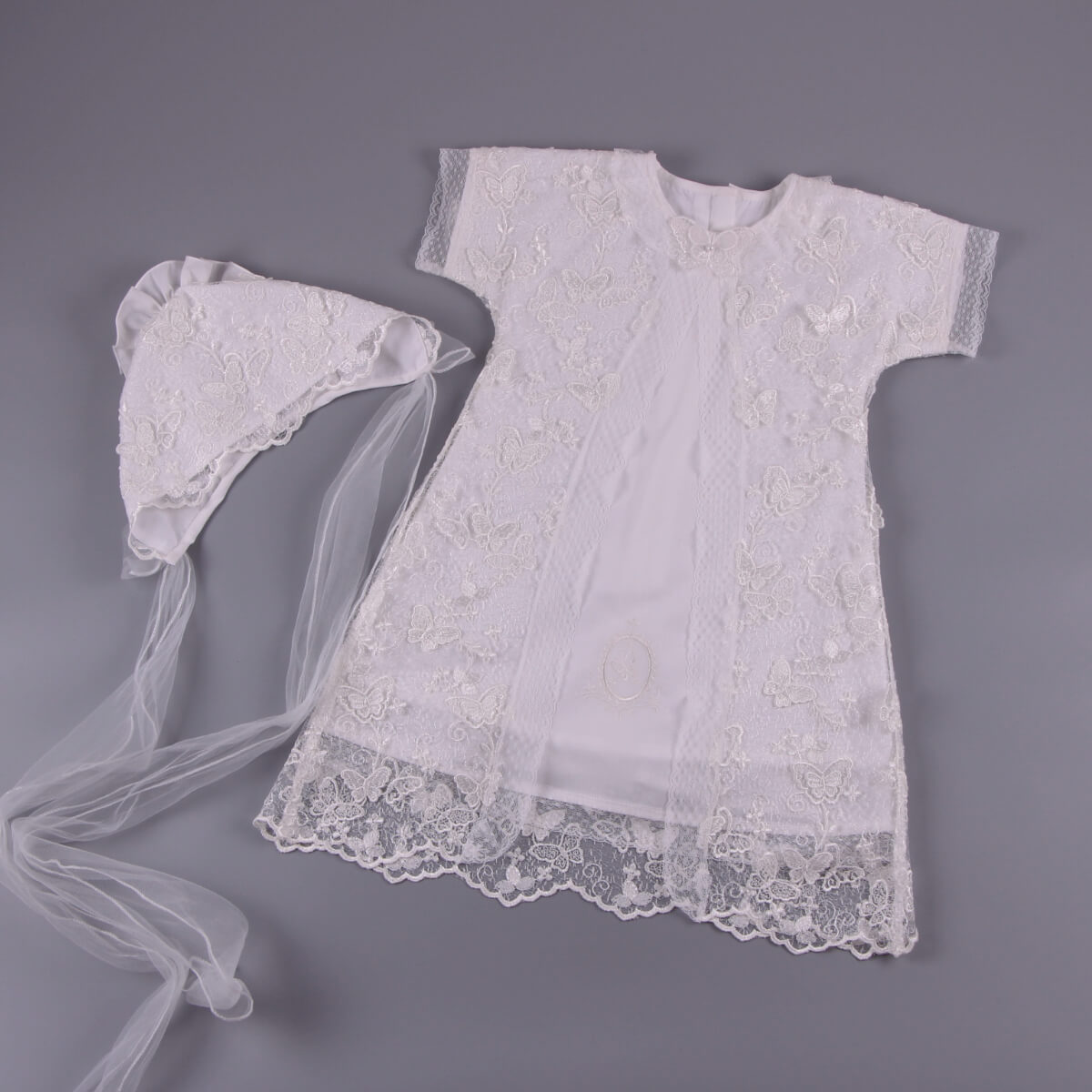  Christening Gown for Girls and bonnet set on a gray background