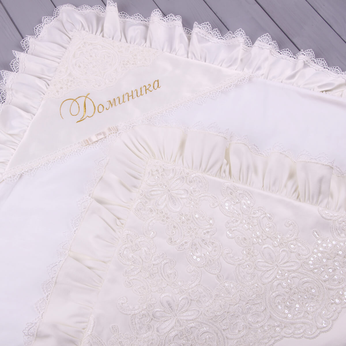 White embroidered christening blanket