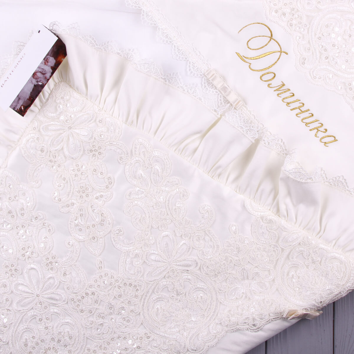 White embroidered christening blanket