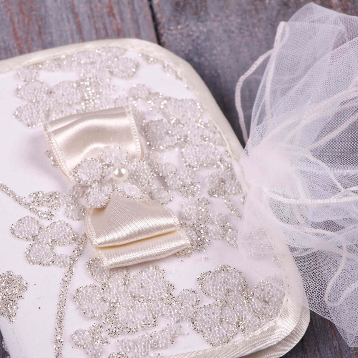 Baby Baptism Keepsake Box with glitter and a bow, surrounded by tulle.