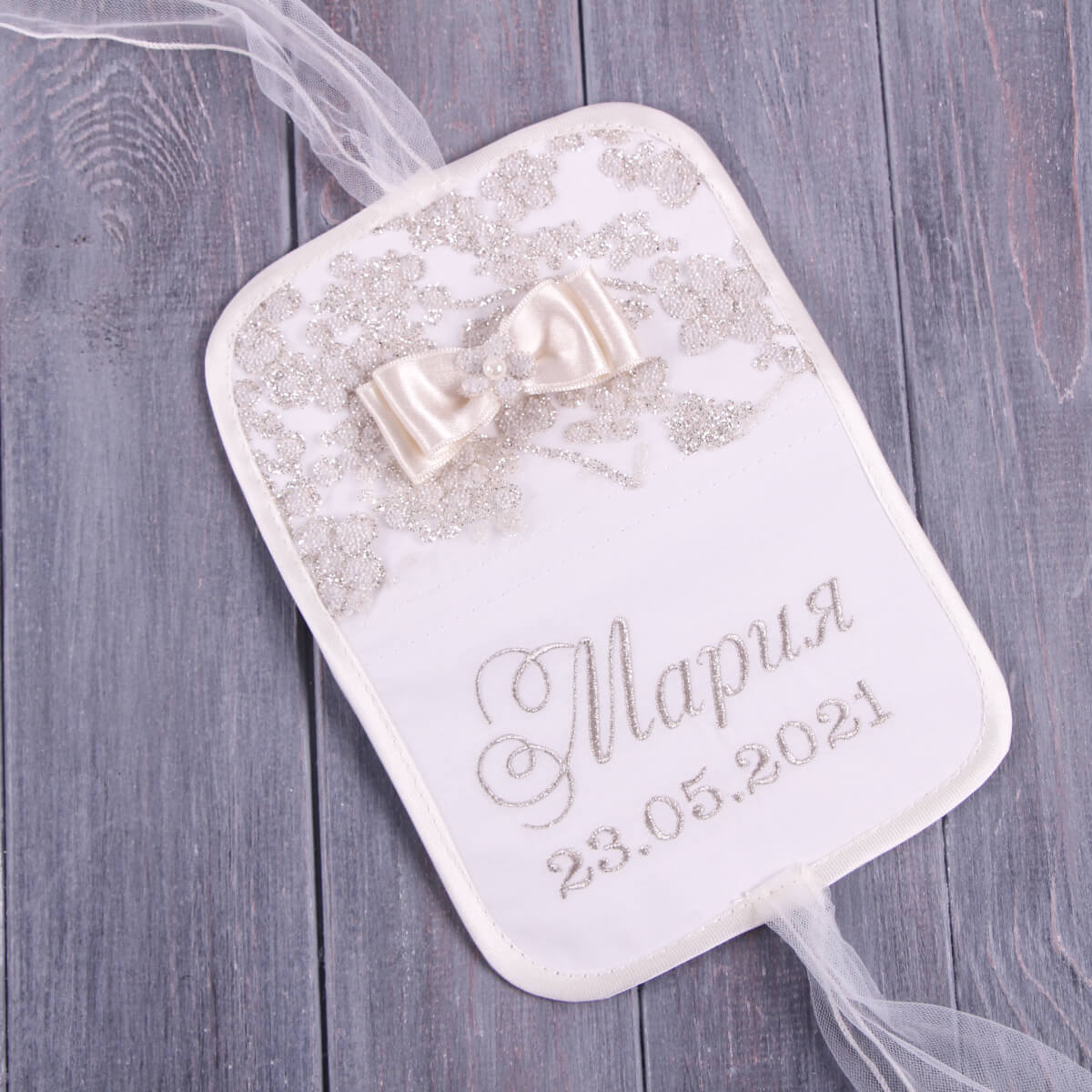 Baby Baptism Keepsake Box with a bow and text on a wooden surface